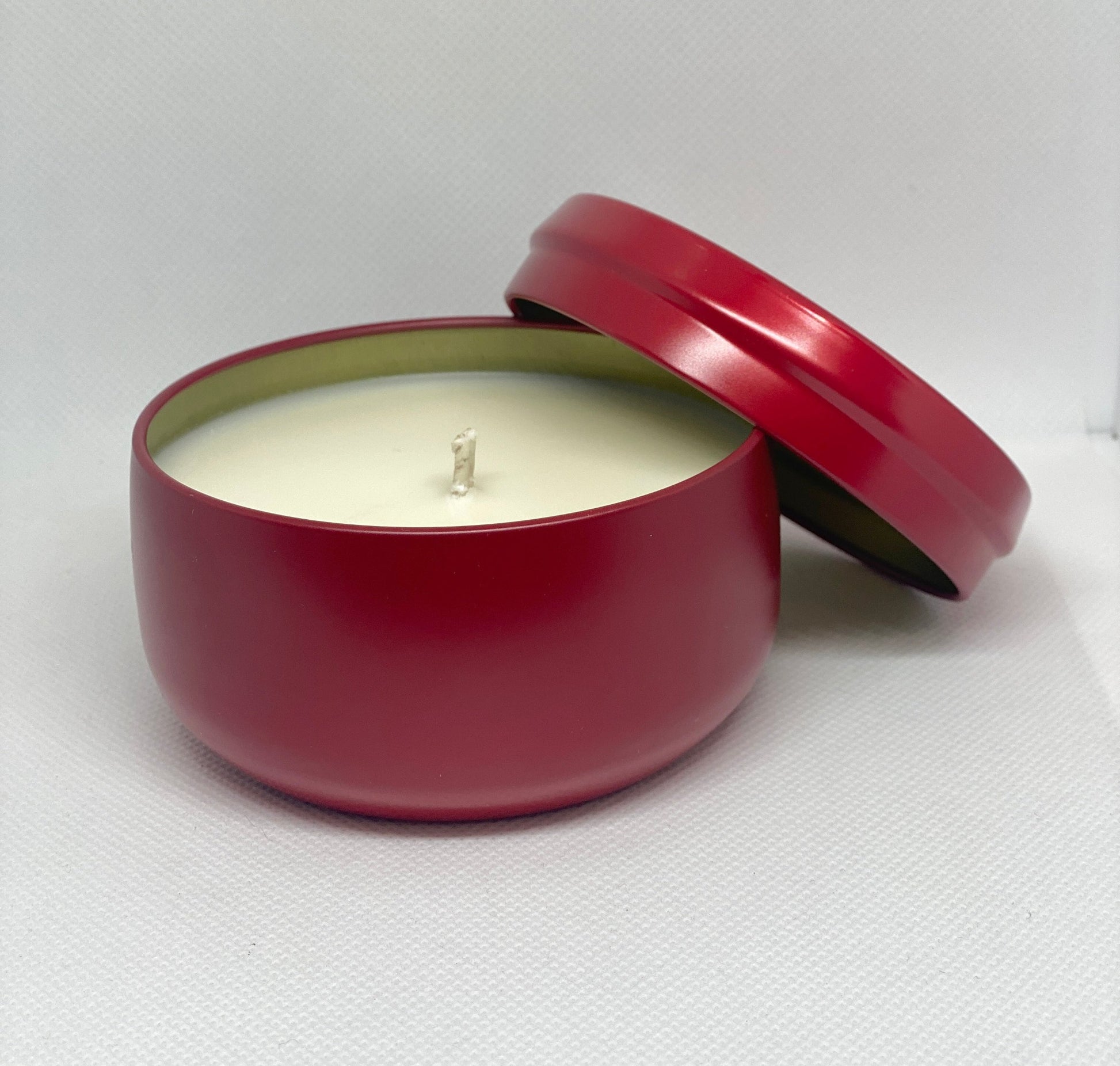 Christmas soy candle in our red tin with lovely Fraser fur scent